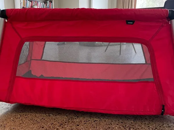 Phil and teds on sale travel cot red