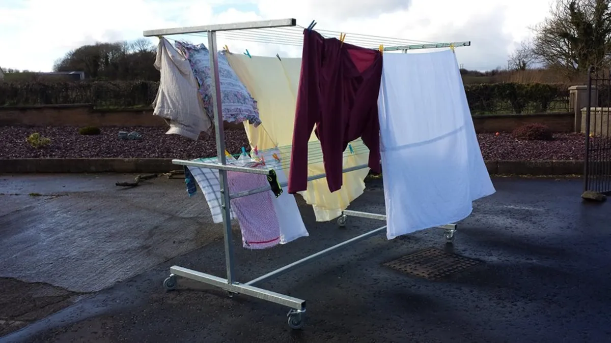 Galvanised mobile cover clothes lines on wheels - Image 1