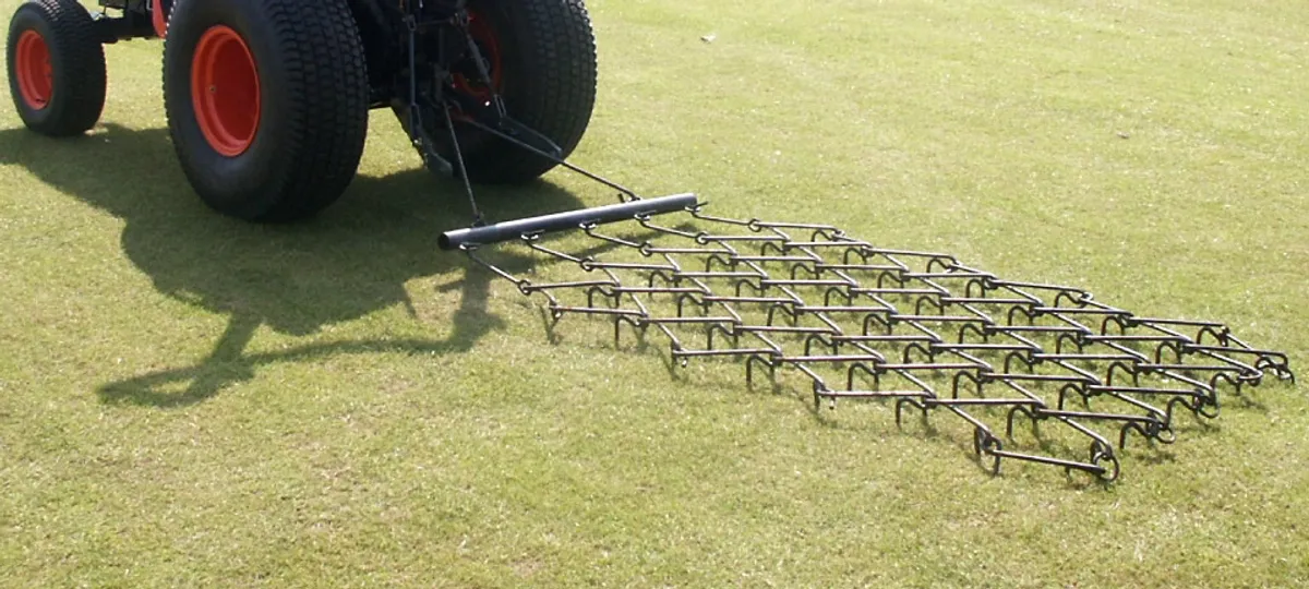 Fleming drag chain harrows