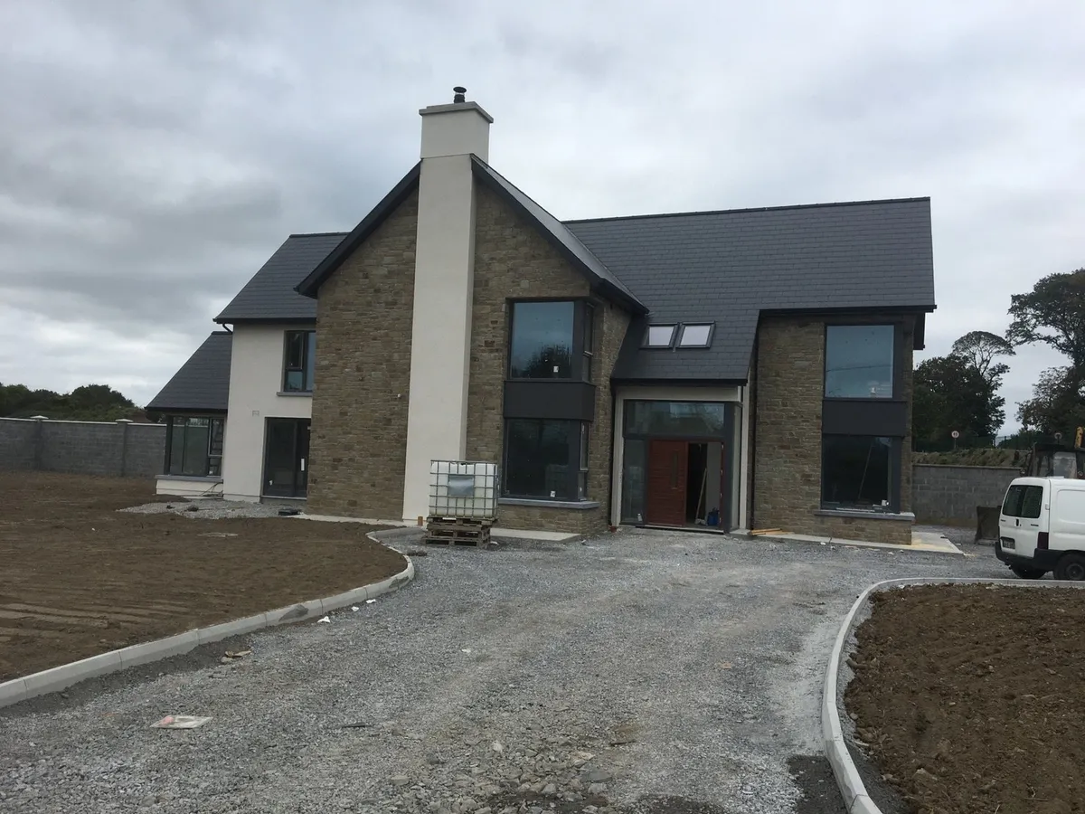 Tipperary Sandstone with Dark Grey / Black Windows