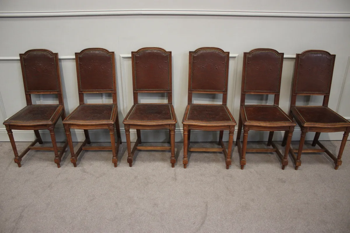 Six French antique chairs with leather