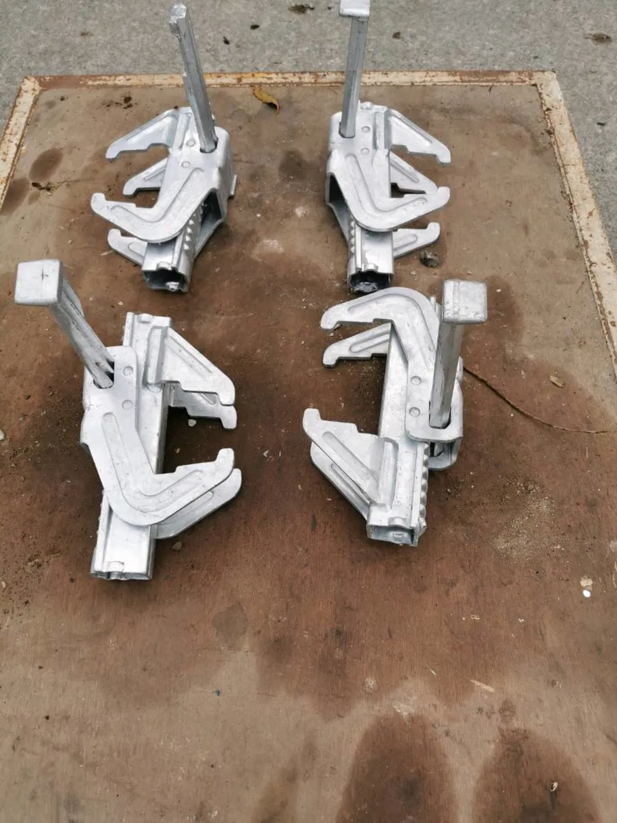 Shuttering clamps and lifting hooks