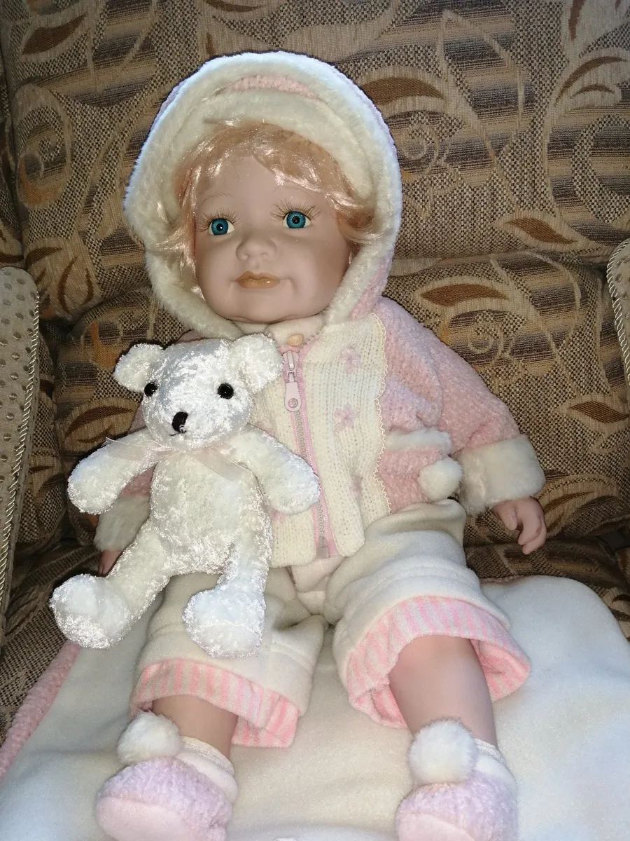 The leonardo collection store porcelain baby doll