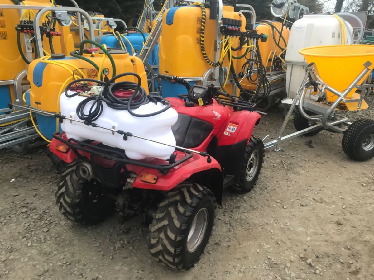 Quad sprayer with boom and hand lance
