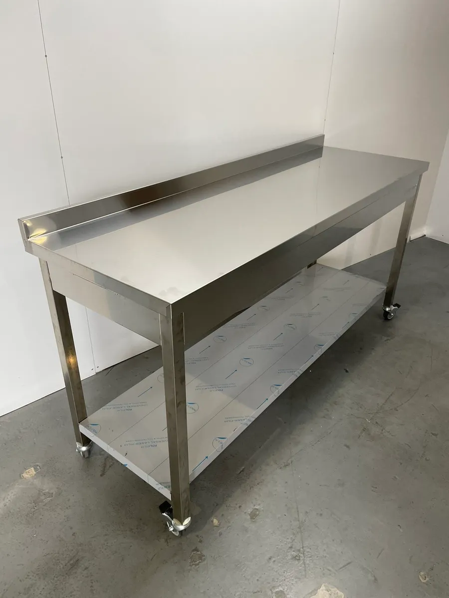 COMMERCIAL STAINLESS STEEL TABLES - Image 1