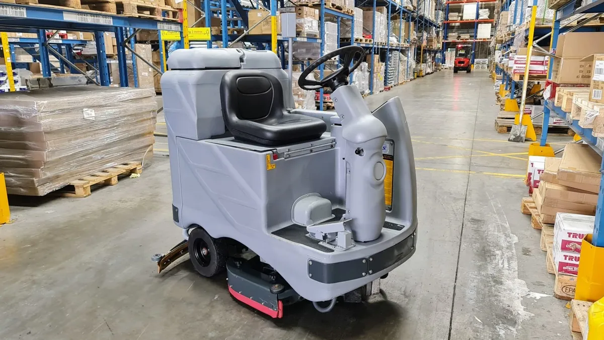 Nilfisk BR850S Rider scrubber dryer warehouse clean machine - Image 1