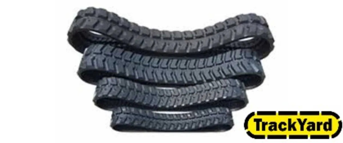 Takeuchi Rubber Tracks - Image 1