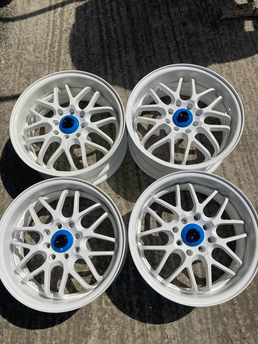 Powder coating wheels and gates