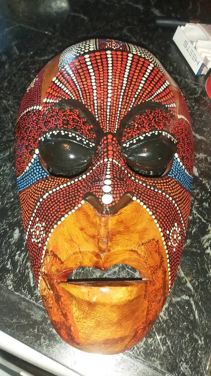Signed wall mask
