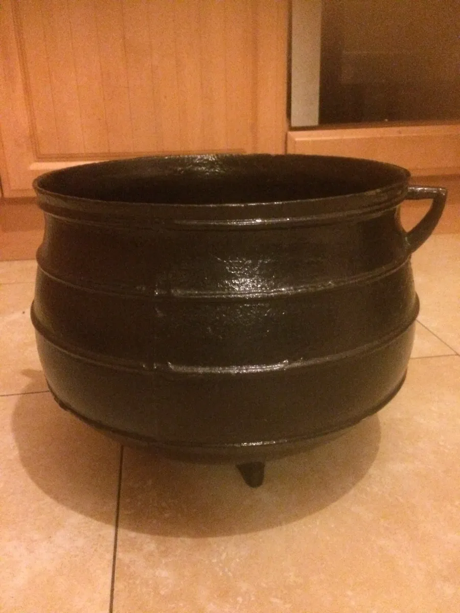 Antique cast iron three legged pot size 8