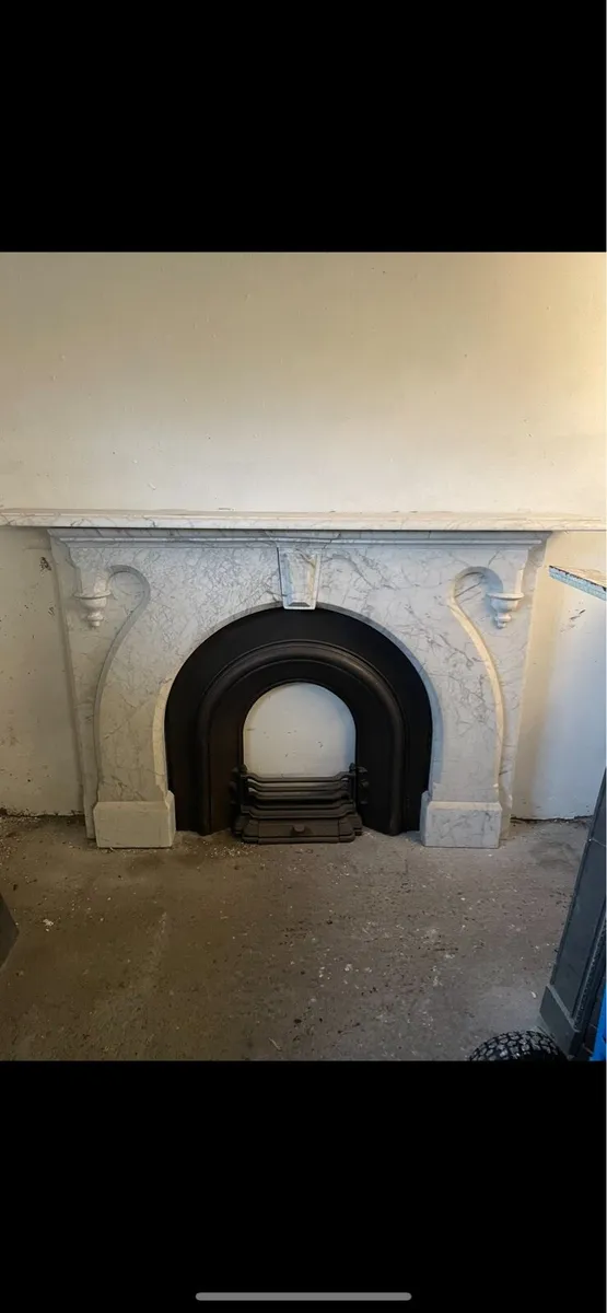 White marble antique fireplace