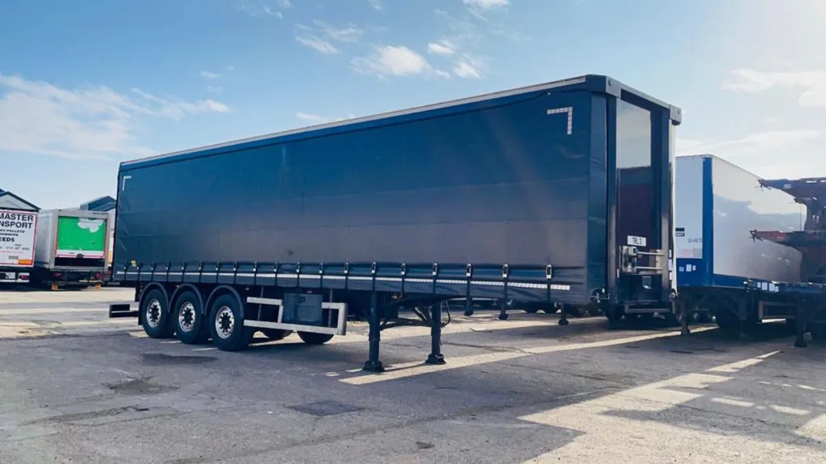 SDC CURTAINSIDE TRAILER WITH MOFFET BRACKETS - Image 1