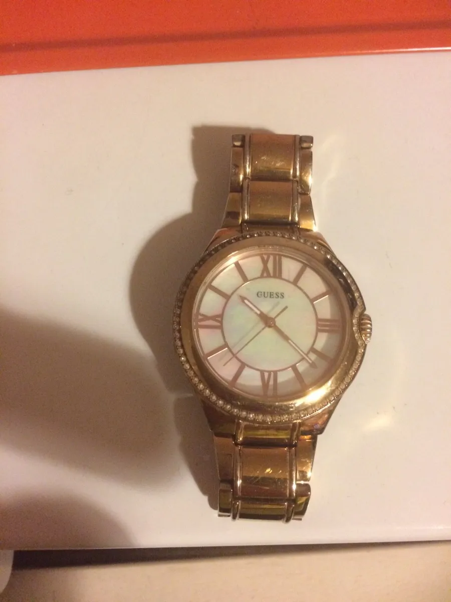 Orginal ladies guess gold watch post available