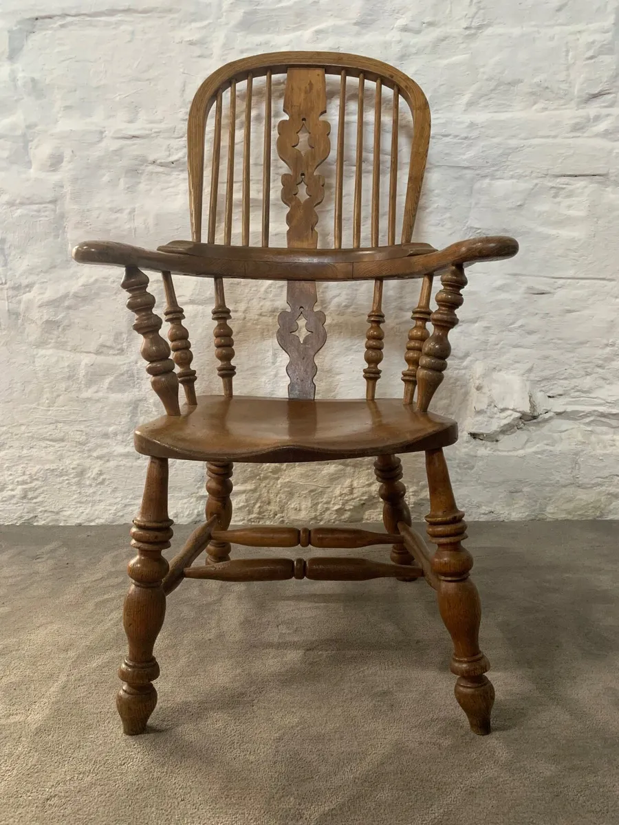 Victorian elm high back Windsor armchair.