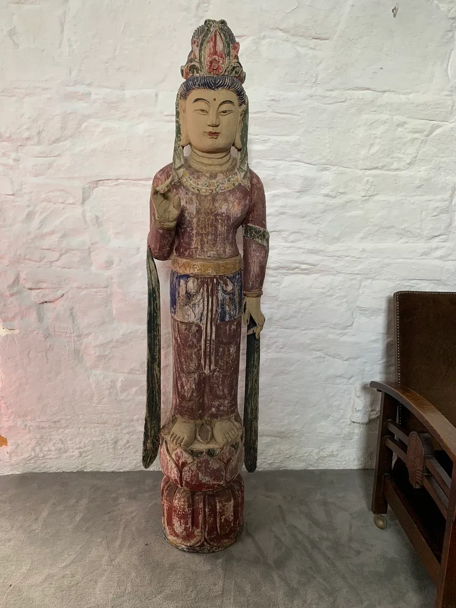 Carved Wooden Figure of Standing Deity.