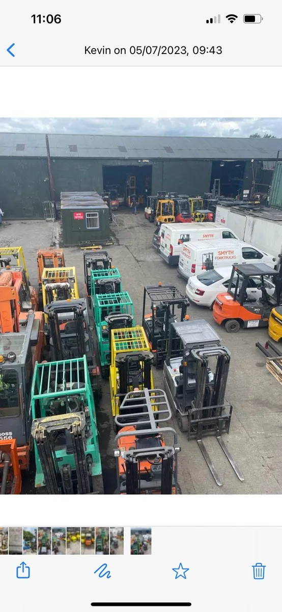 A large selection of forklifts and forklift masts. - Image 1