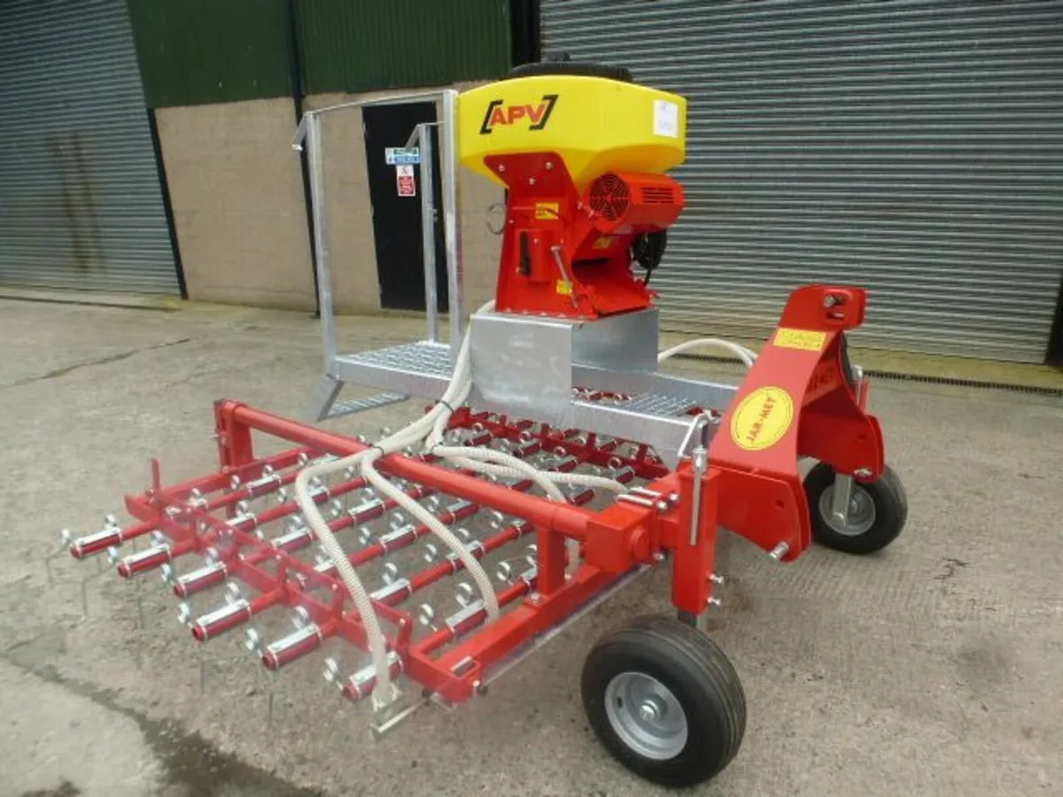 3m spring tine harrow fitted with APV Seeder - Image 1