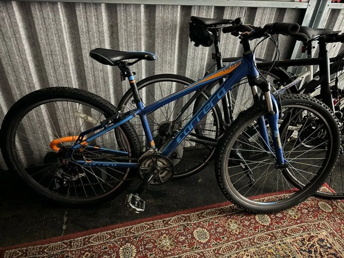 Carrera blue and orange bike hot sale