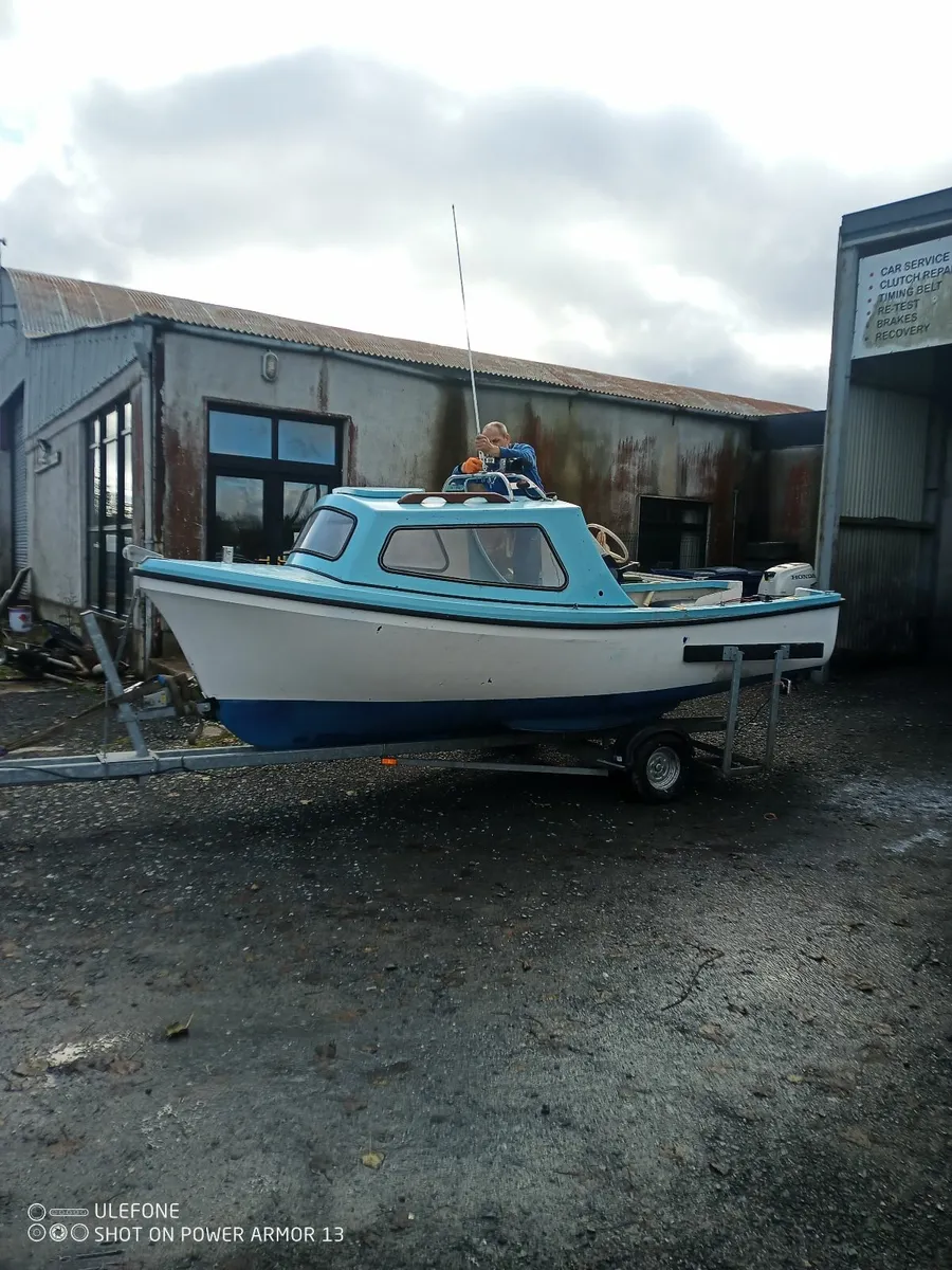 16 Oyster Boat + engine and trailer