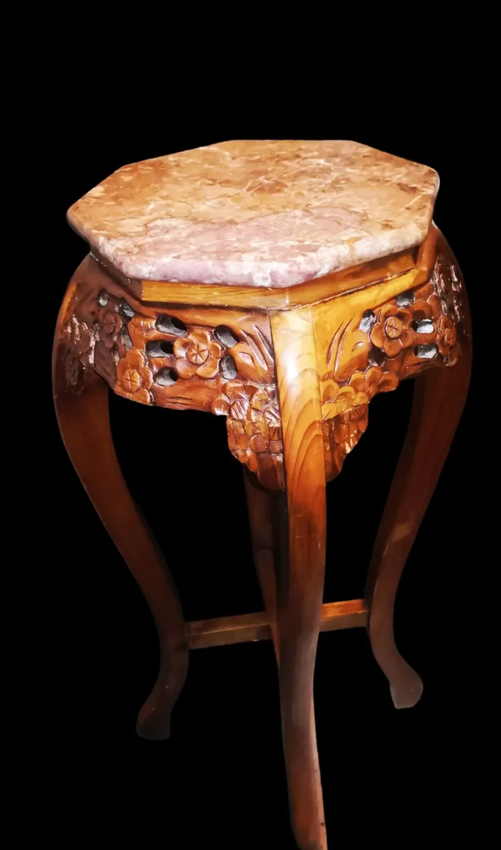 Red marble hand carved table