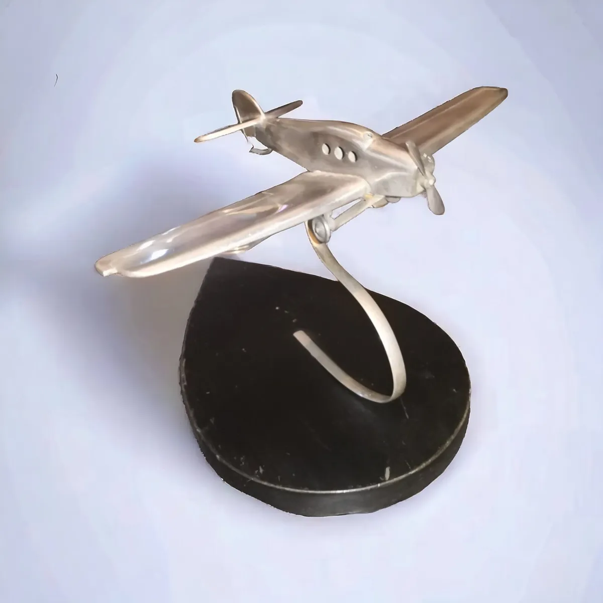 Large silver metal airplane model - Image 1