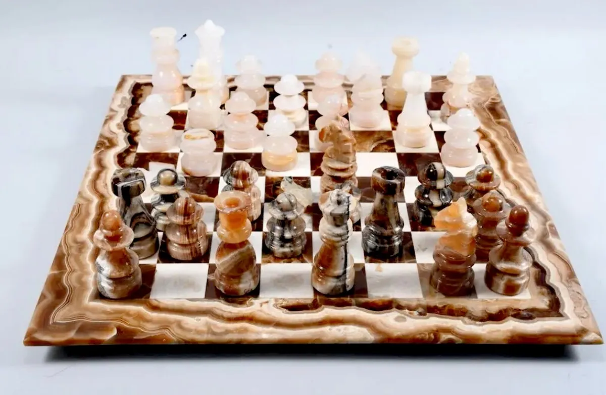 Unique marble chess board with 32 figurines