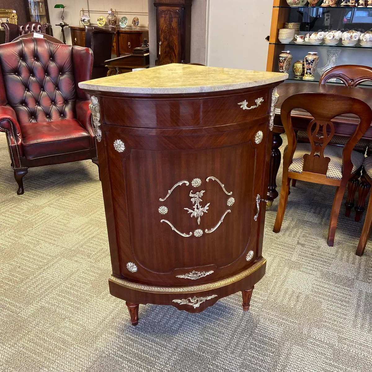 French corner cabinet with a large single drawer