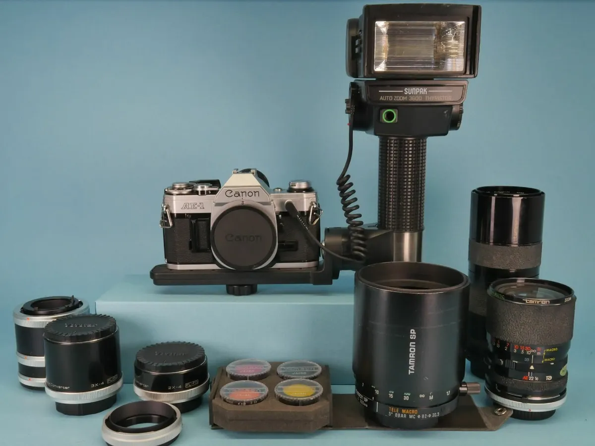 Canon AE1 with 3 lenses and lots of extras - Image 1