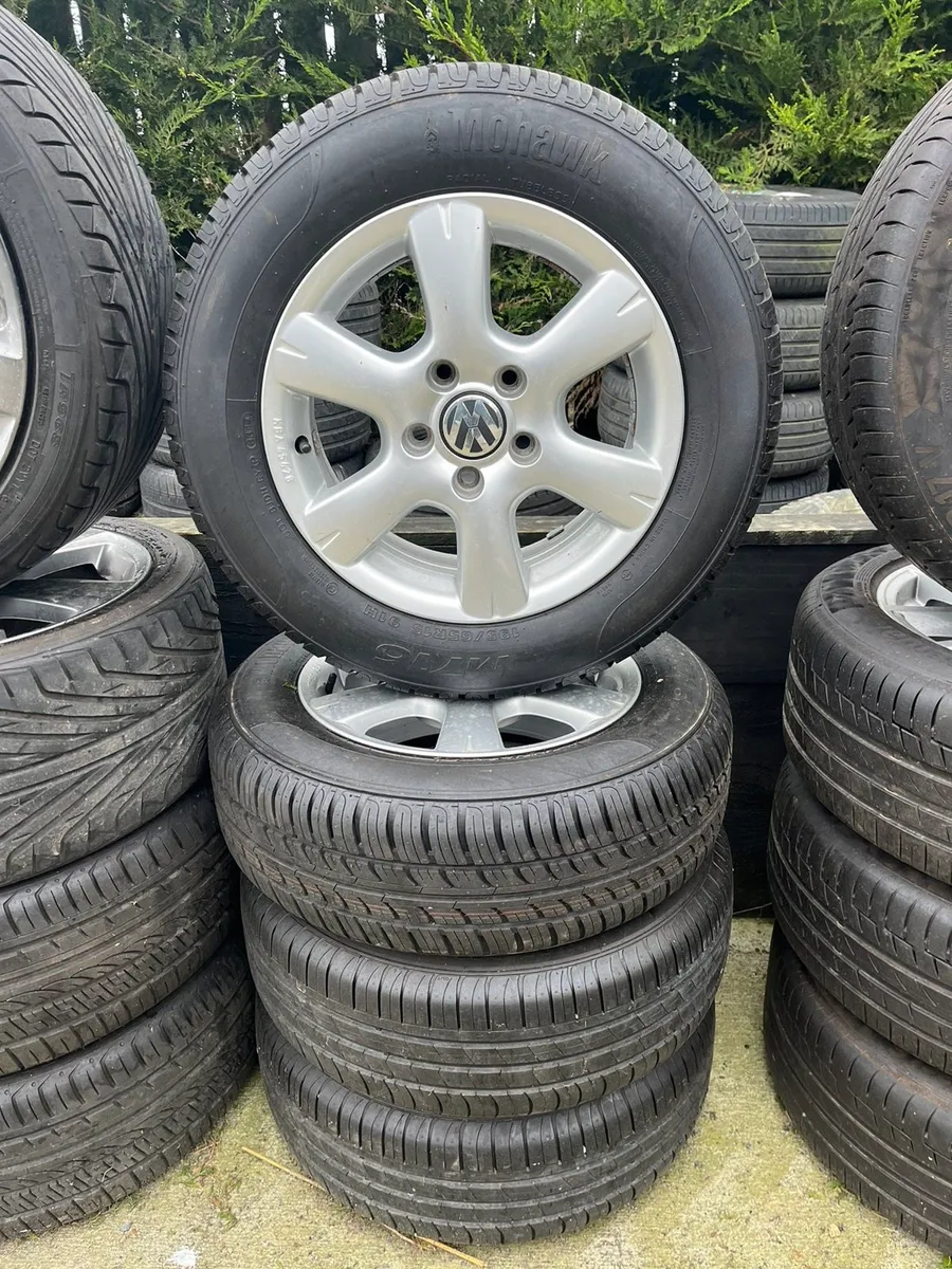 SELECTION OF ALLOYS AND TYRES - Image 1