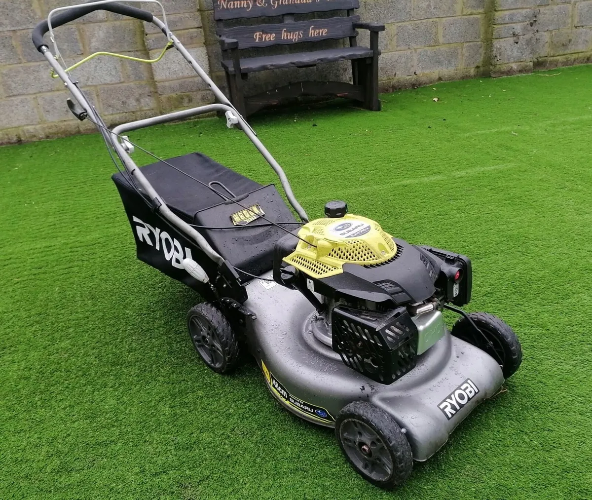 Ryobi petrol lawn store mower 140cc