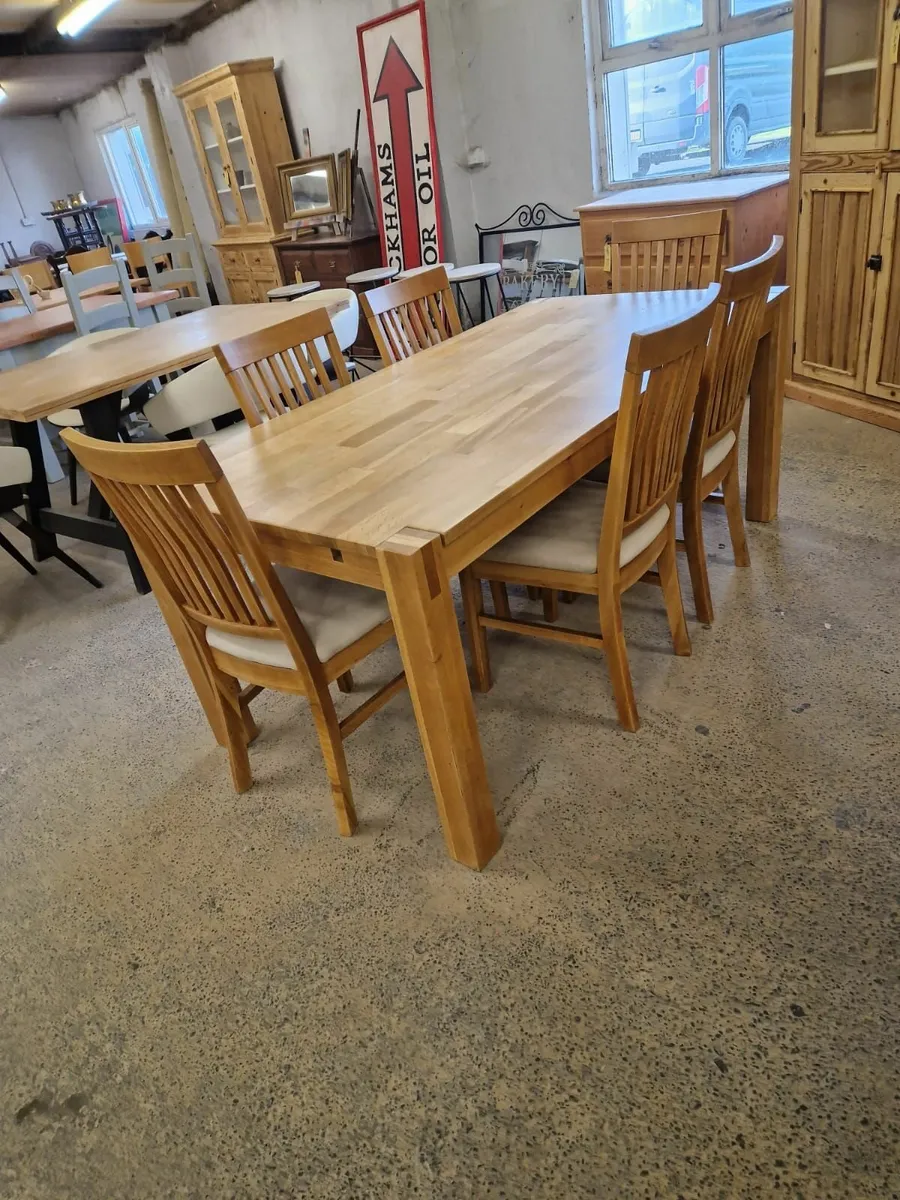 Oak table and 6 deals chairs for sale