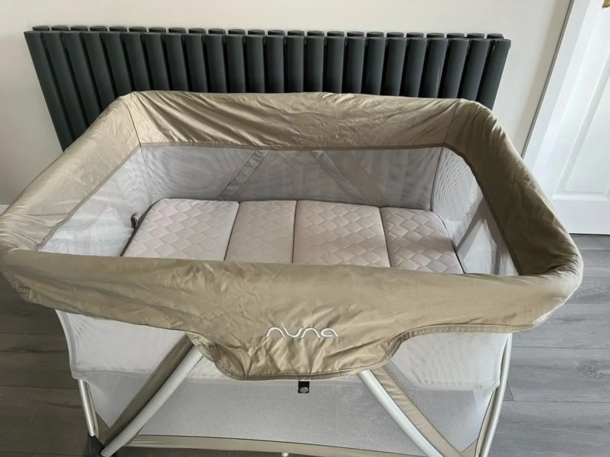 Nuna sena store travel cot