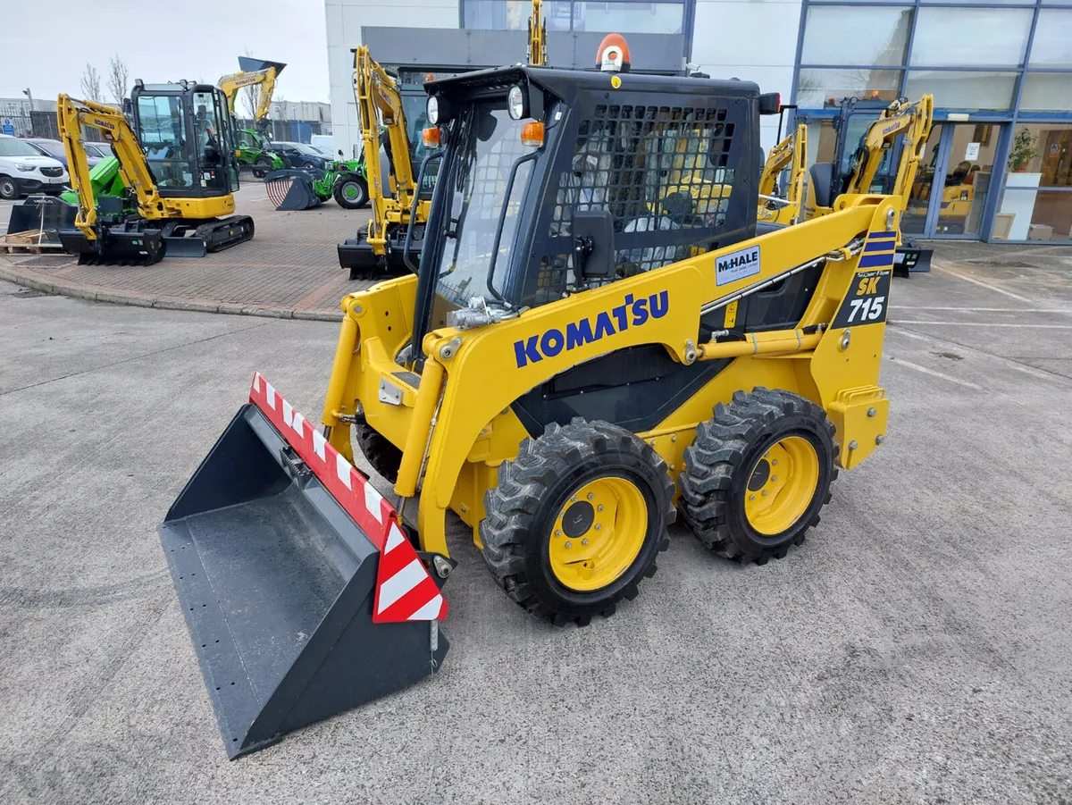 Komatsu SK715-8 Skid Steer - Image 1