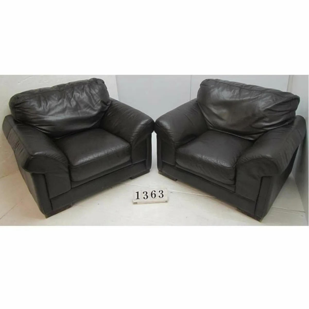 Pair of large leather armchairs.   #1363