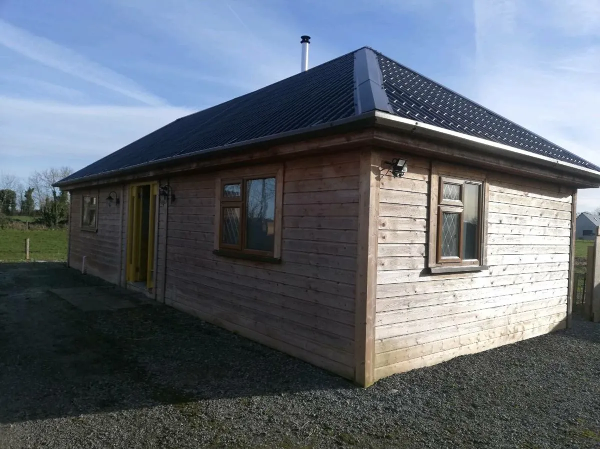1 bed timber cabin, shed and storage container