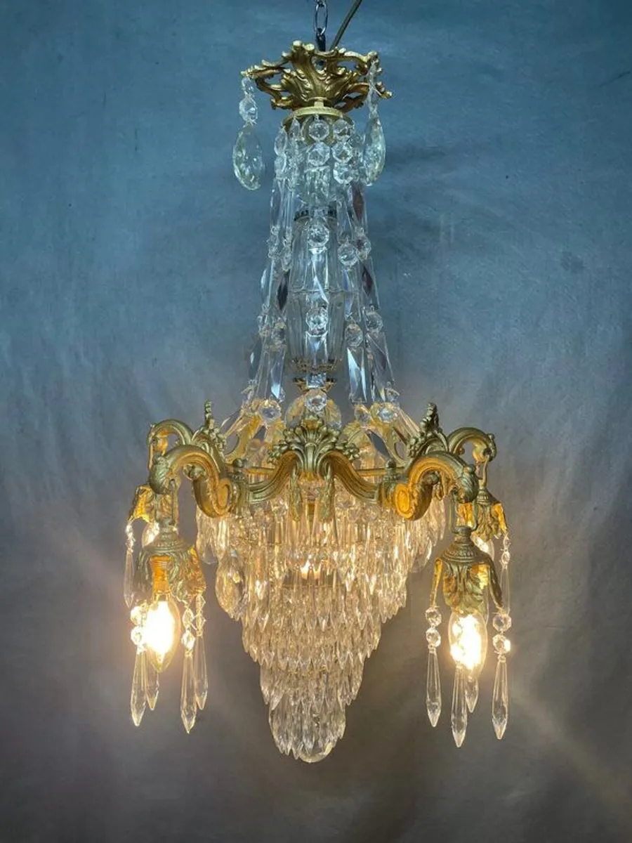 A Stunning Brass and Crystal Chandelier. - Image 1