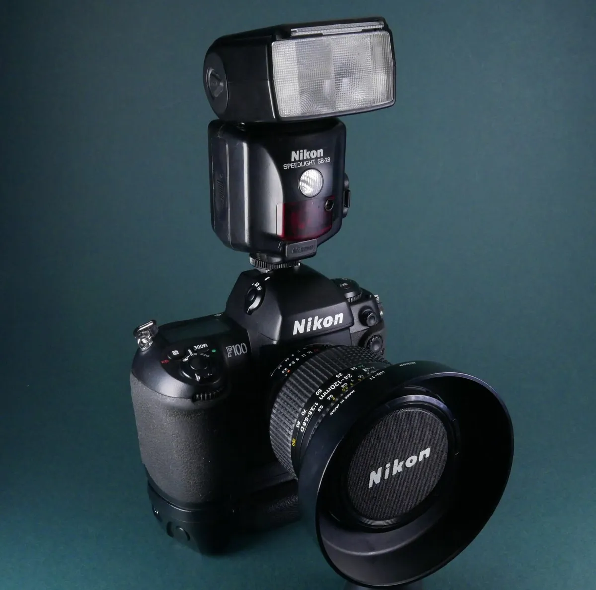 Nikon F100 film camera with accessories