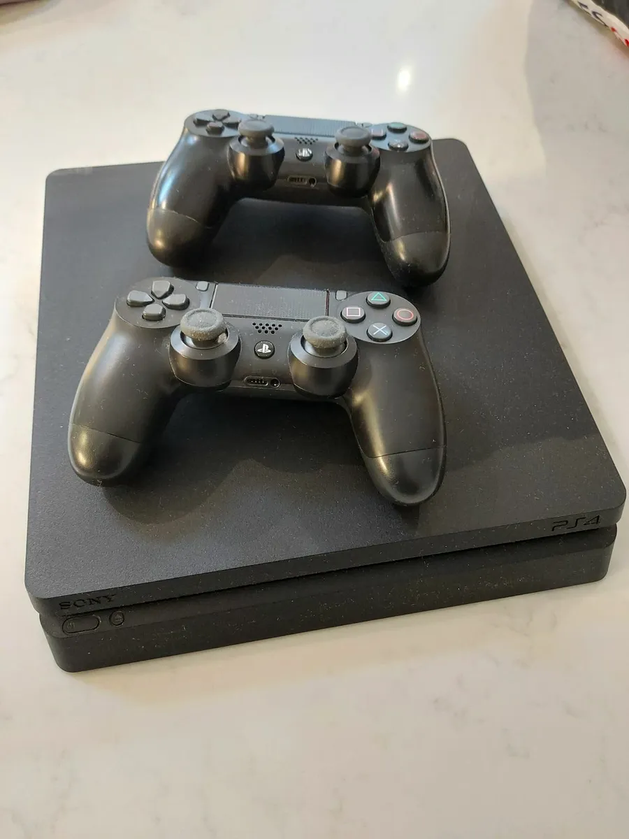 Ps4 for sale with store 2 controllers