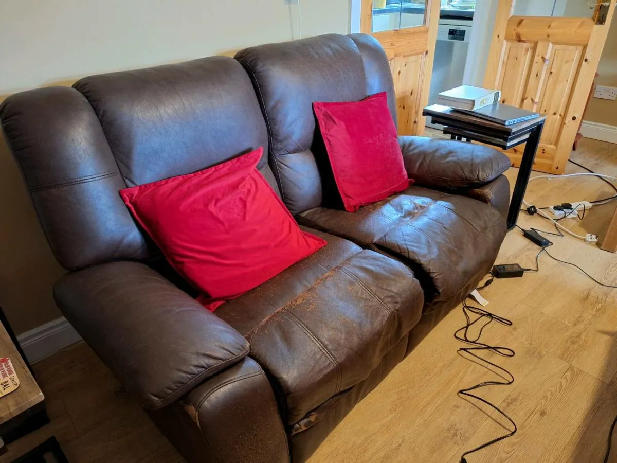 Brown leather 2 seater recliner sofa. (X2).