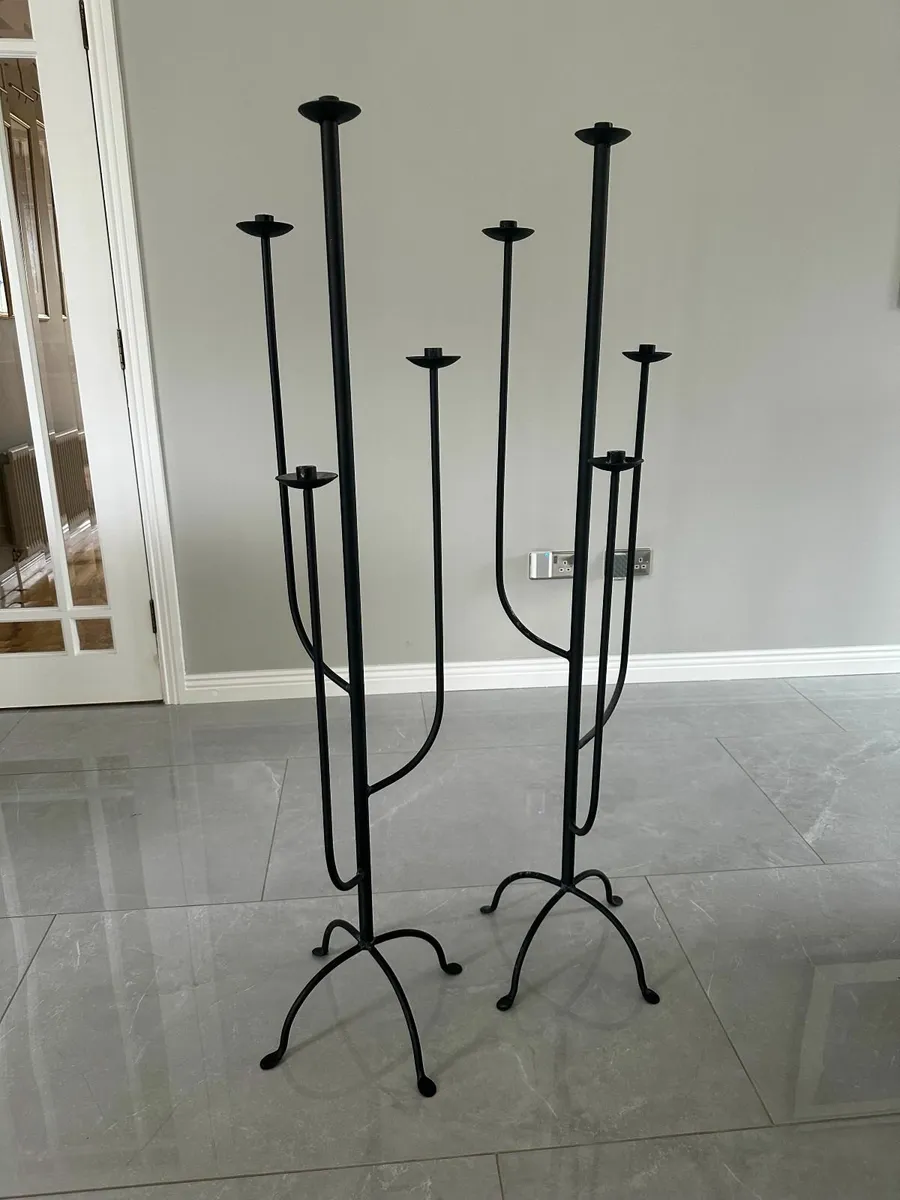 Floor standing iron candle sticks