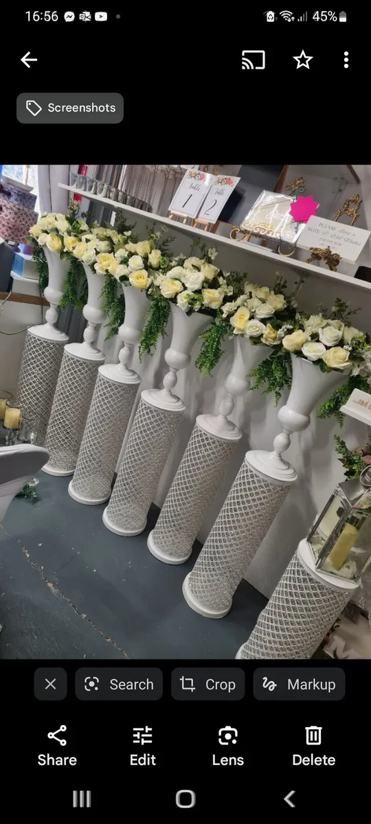 6 crystal vases 2 matching pillars