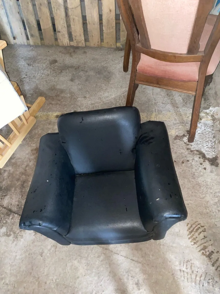 Children’s black leather chair