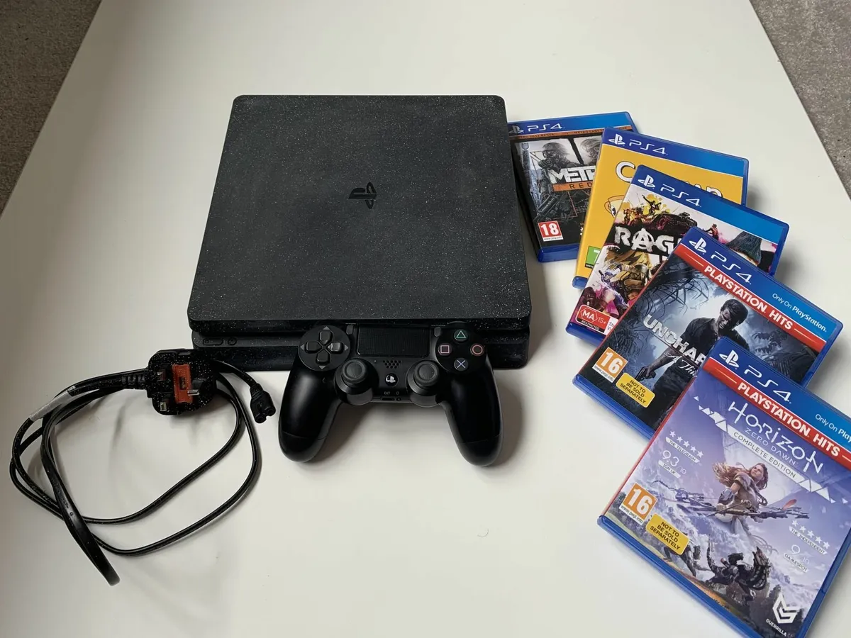 Sony Playstation 4 Slim with Games