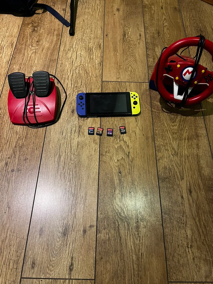 Nintendo Switch and Mario Kart Steering Wheel