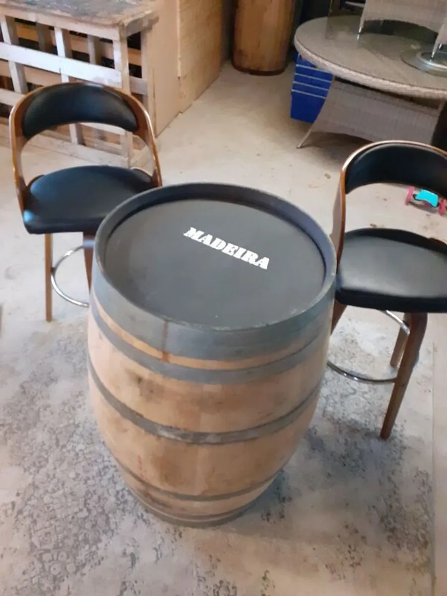 barrell and 2 bar stools. Sell as a set.