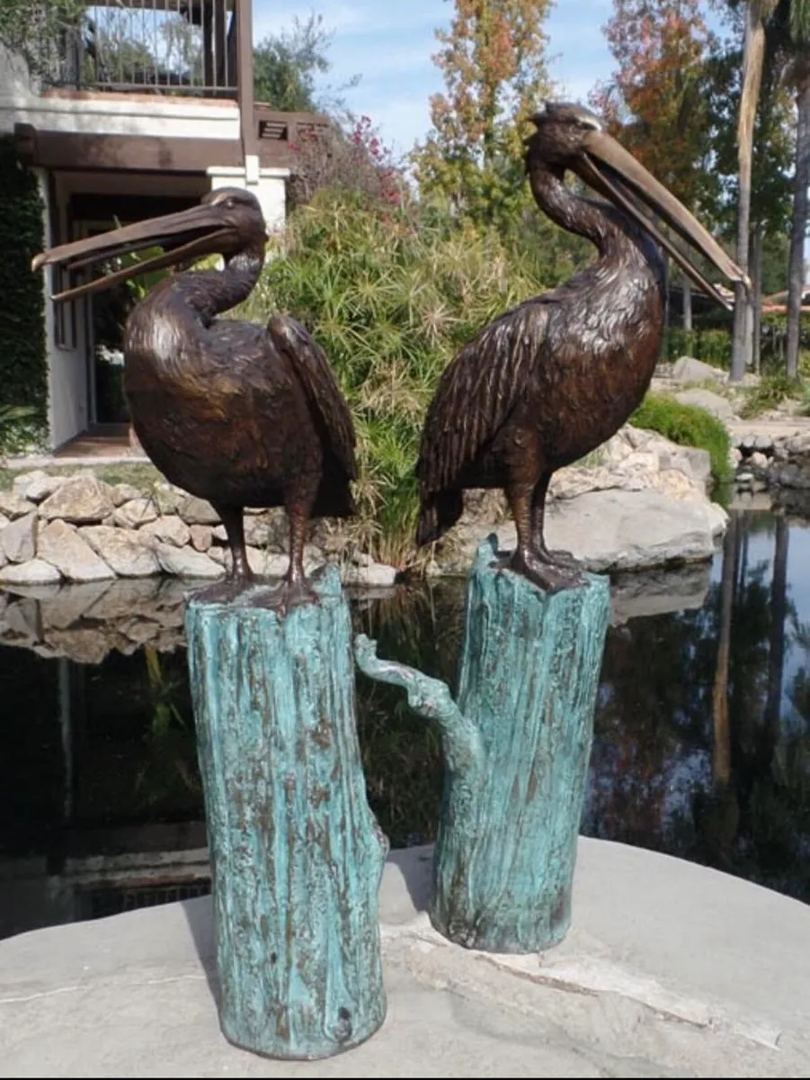 Pair bronze pelicans