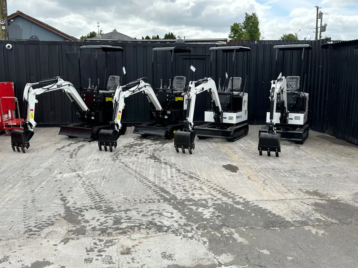 Choice of 4 JPC KV12 Mini Diggers - Image 1