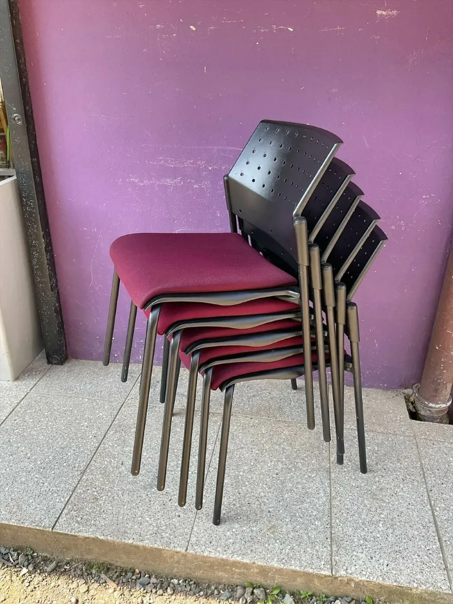 Upholstered stacking chair - Image 1