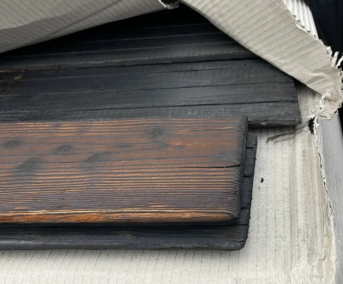 Charred light Amber Larch Cladding - Image 1