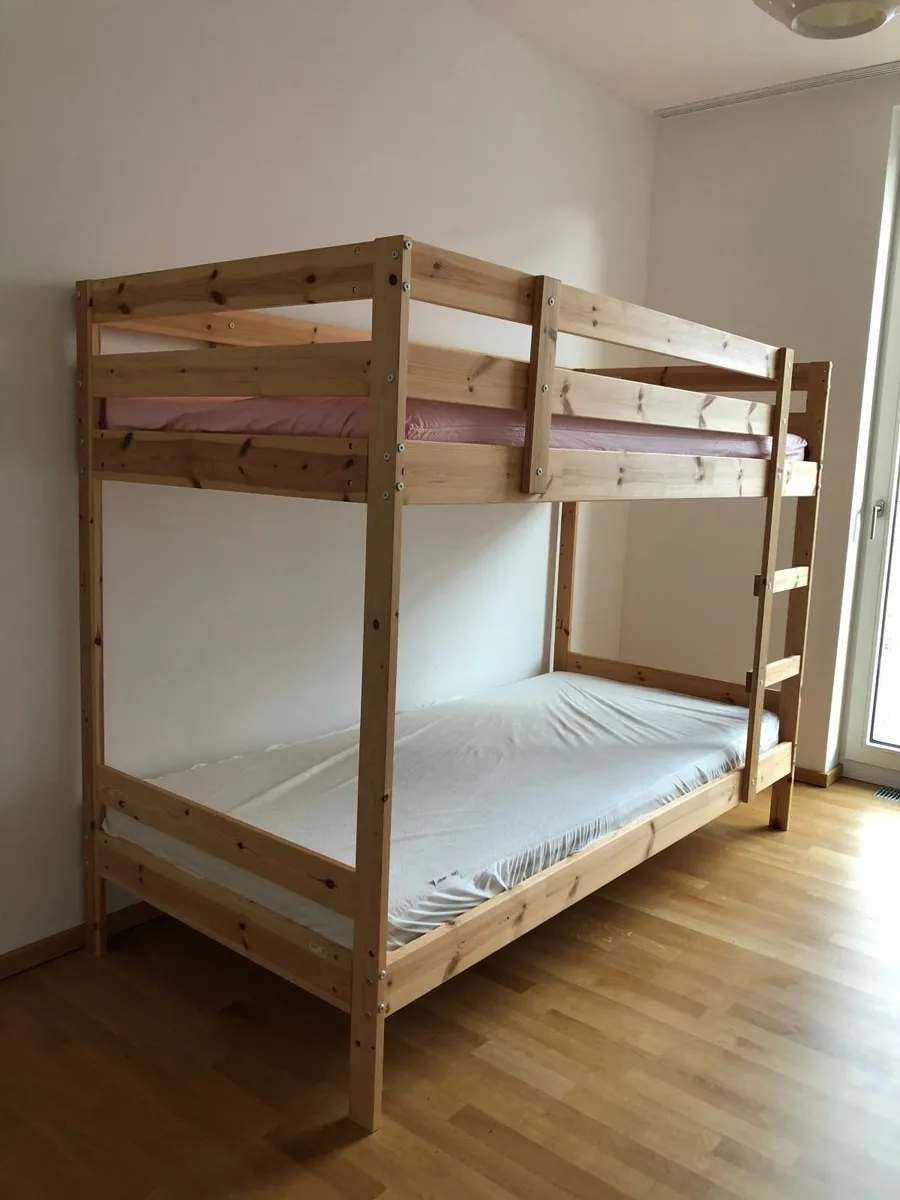 Twostory wooden IKEA bunk bead with mattresses for sale in Co. Dublin
